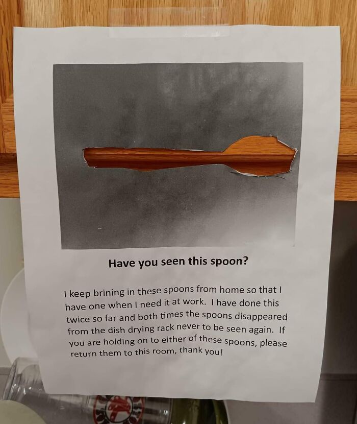 Humorous coworkers' note asking about a missing spoon with a printed image and plea for its return.