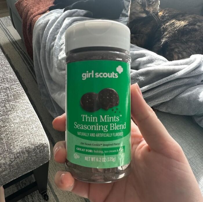 Hand holding a jar of Thin Mints Seasoning Blend, ideal treat for your own Easter basket.