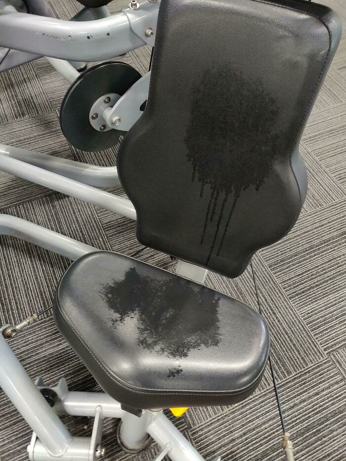 Gym equipment seat left sweaty, lacking basic etiquette.