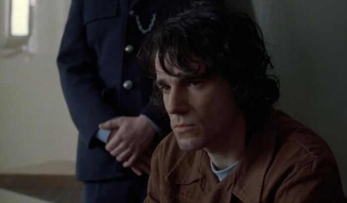 Actor portraying a difficult role in a dramatic scene, showing intense emotion and focus for challenging acting.