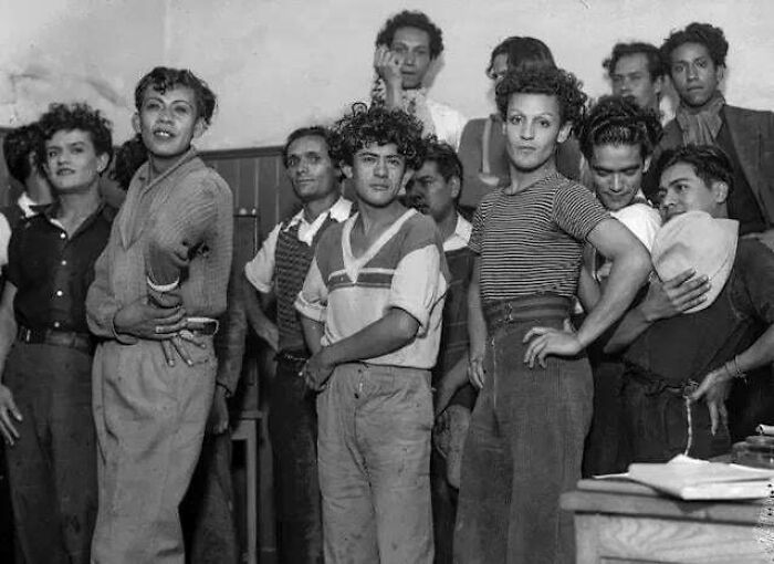 Group of young people posing in casual 1950s attire, capturing a moment that fascinates from the past.