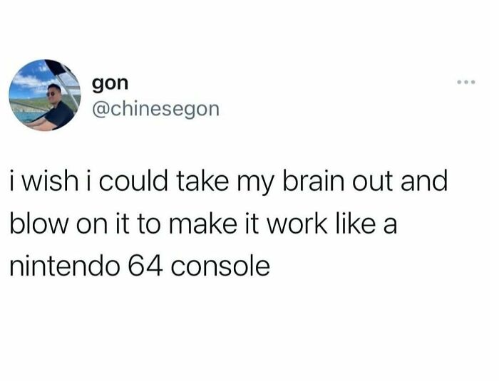 Millennial misery meme about fixing the brain like a Nintendo 64 by blowing on it, featuring a tweet from gon.