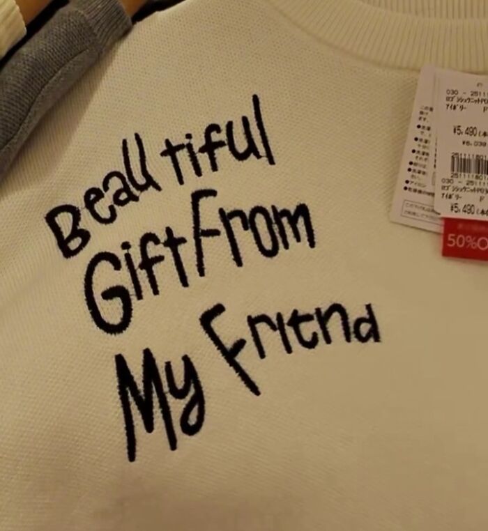 Poorly translated shirt in Japan reads "Beal tiful Gift From My Fritnd" on a white fabric.