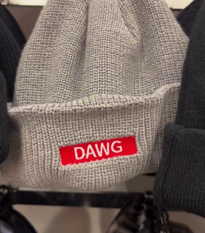 Gray knitted beanie with the word "Dawg" in bold letters, showcasing unique style choices in Japan.