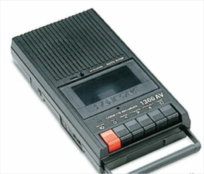 Retro black cassette recorder with control buttons, evoking nostalgia.