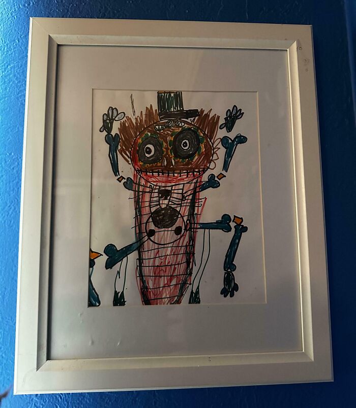Framed creepy drawing with childish, colorful monster figure and chaotic lines.
