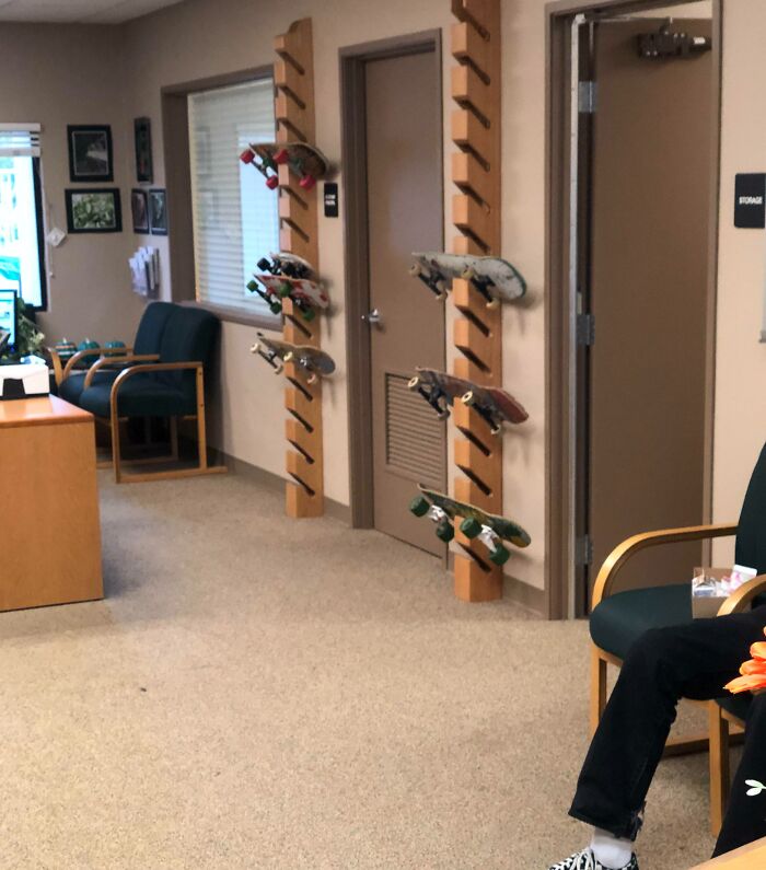 Skateboards on racks in an American school hallway, highlighting unique school features.