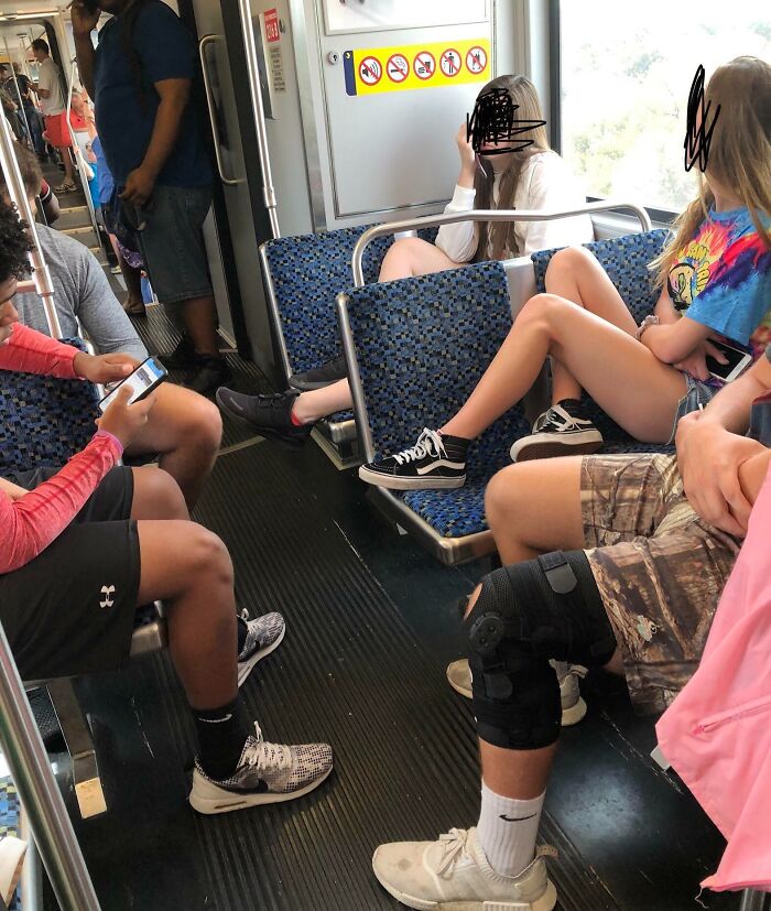 People on public transport sitting improperly, showing lack of basic etiquette.