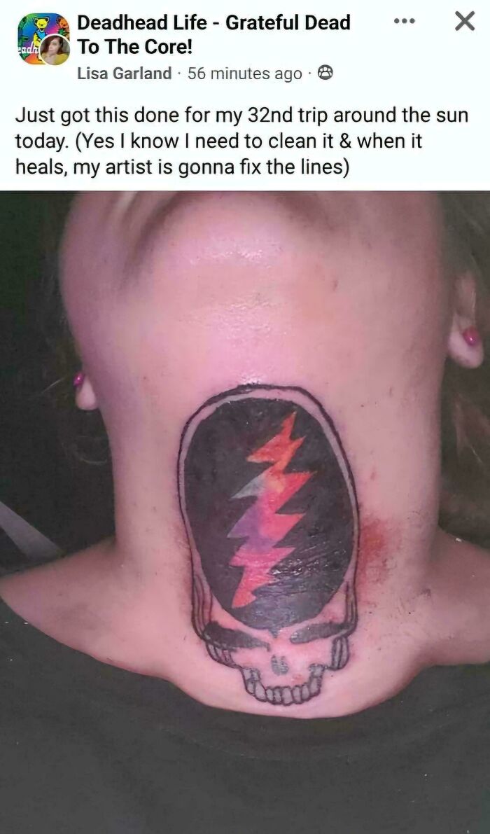 Tattoo fail on the neck featuring a poorly executed skull and lightning bolt design with uneven lines and colors.