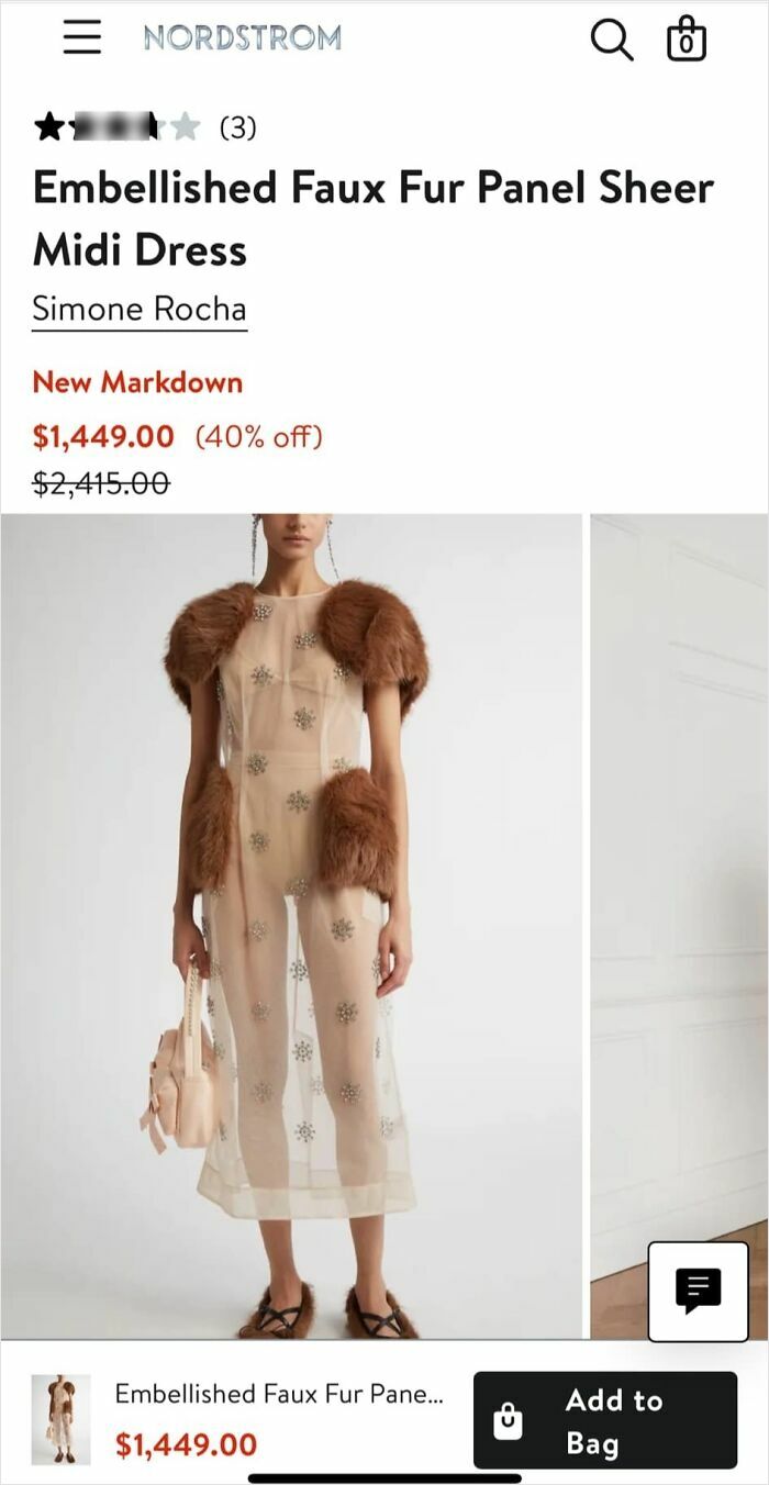 Model in a sheer midi dress with faux fur panels, showcasing a unique fashion design.