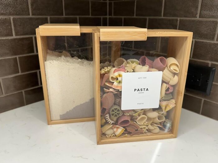 Bamboo containers storing colorful pasta and flour, showcasing trendsetting kitchen organization treasures.