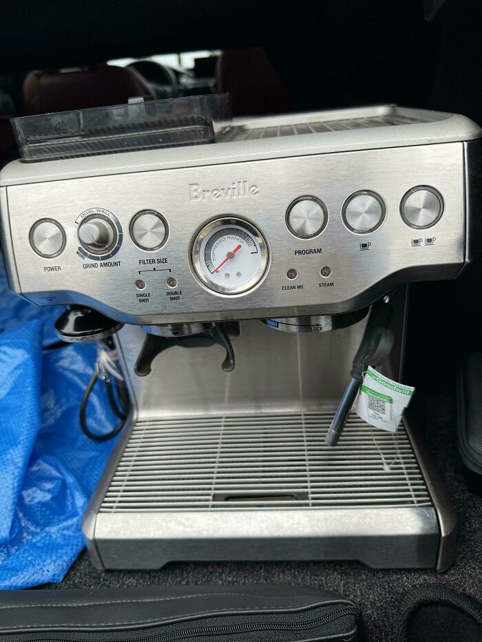 Breville espresso machine found at Goodwill, a hidden gem on display with controls and steam wand visible.