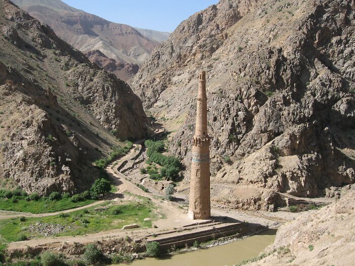 A tall, ancient minaret set in a rocky valley, representing an architectural wonder not very well-known.
