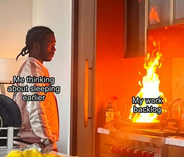 Person staring at a stovetop fire labeled as work backlog, with text about thinking of sleeping earlier, highlighting work meme humor.