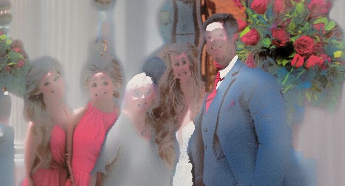 A blurred, distorted wedding photo of five people, with a man in a blue suit and red tie, highlights a worse day scenario.