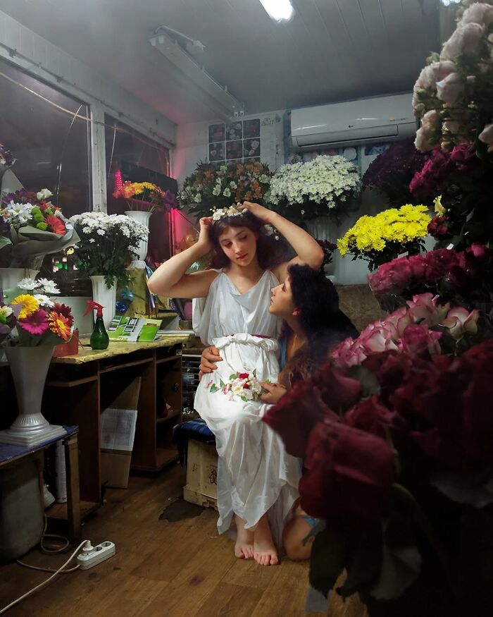 Classical figures in a modern flower shop setting by Alexey Kondakov.