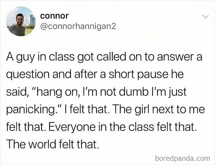 Tweet highlighting introverts' struggle with social anxiety in class, feeling panicked over being called on unexpectedly.