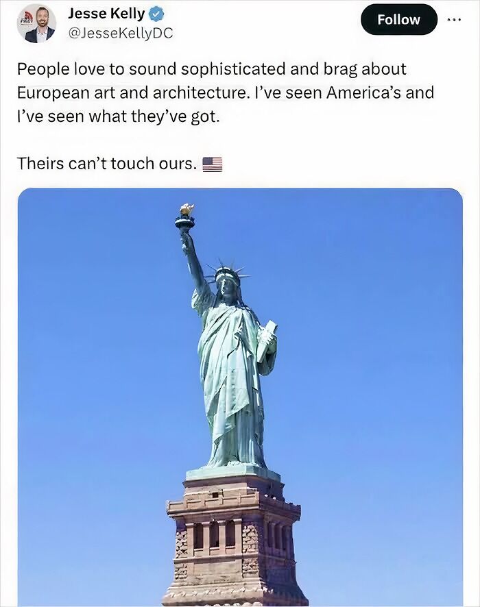 Statue of Liberty under clear sky with a confidently incorrect tweet praising American architecture.