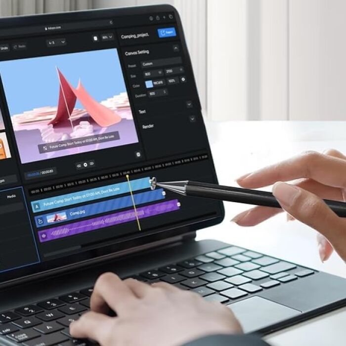 Person using a pen and laptop to edit a video, showcasing digital tools related to Amazon haul finds and popular products.