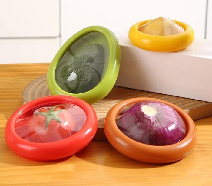 Colorful Amazon haul finds including reusable food covers for fruits and vegetables displayed on wooden surface.