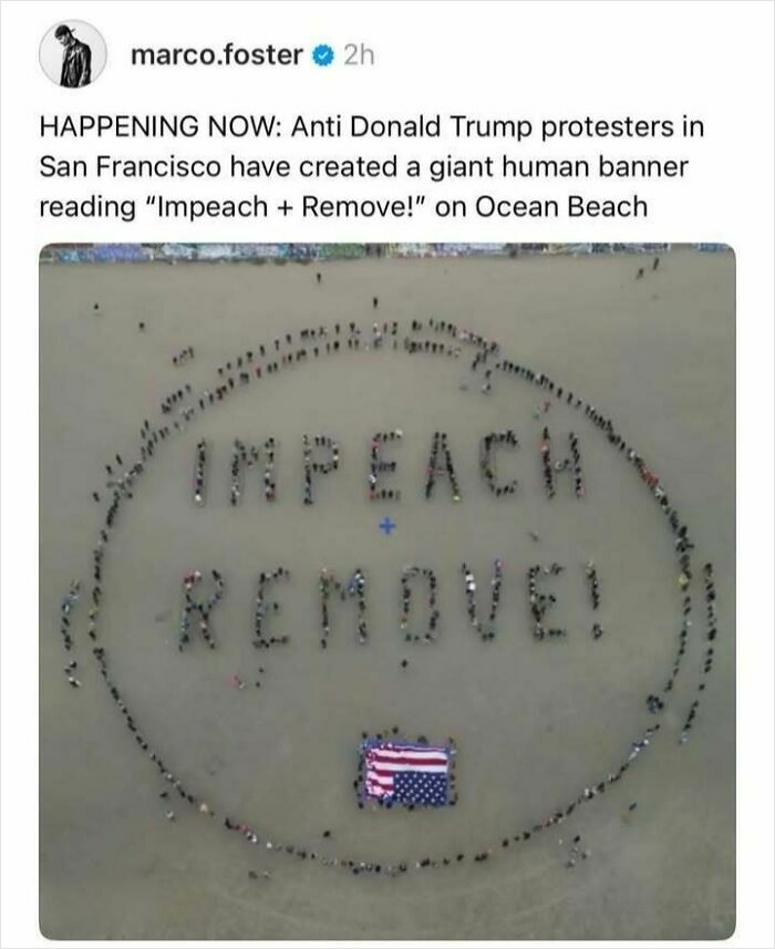 People forming "Impeach + Remove!" on beach, expressing frustration with capitalism.