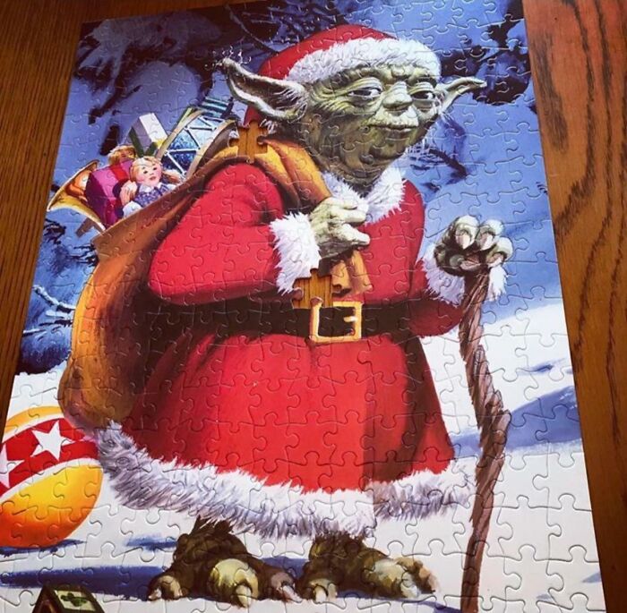Santa Yoda puzzle with a playful Christmas theme in a snowy setting.