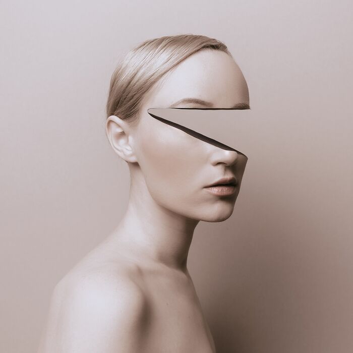 Surreal self-portrait by artist using Photoshop, featuring a woman with a geometric cutout across her eyes.