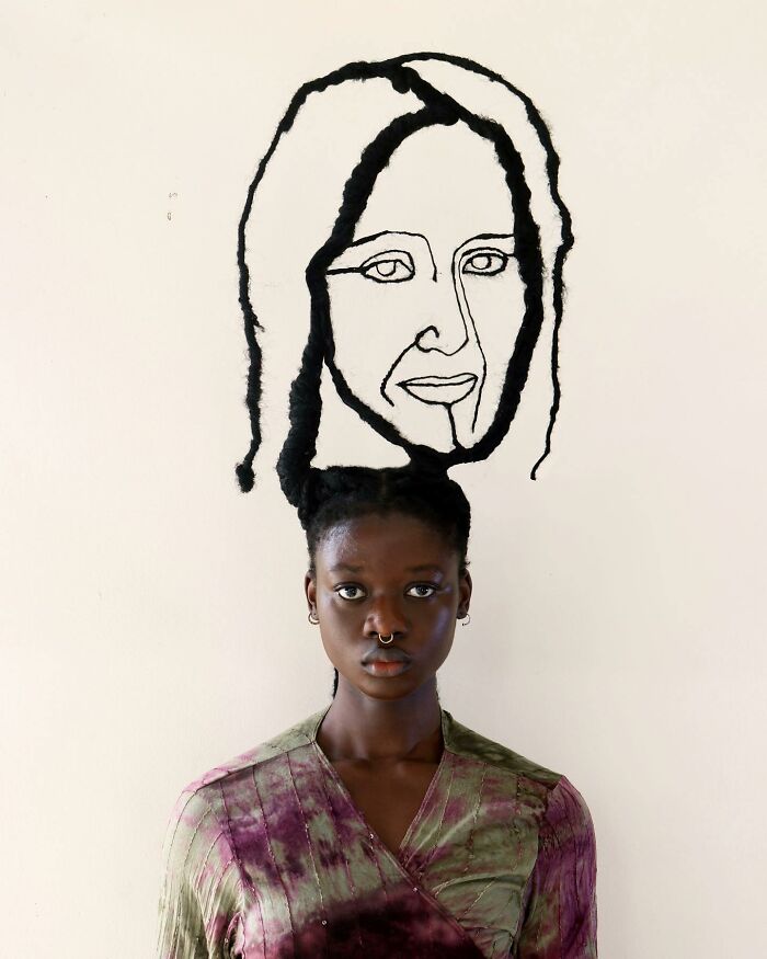 Artist uses hair for unique face sculpture, blending art and hairstyling for a striking visual impact.