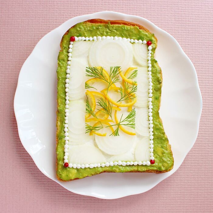 Creative toast design with sliced vegetables and dill on white plate by Japanese artist.