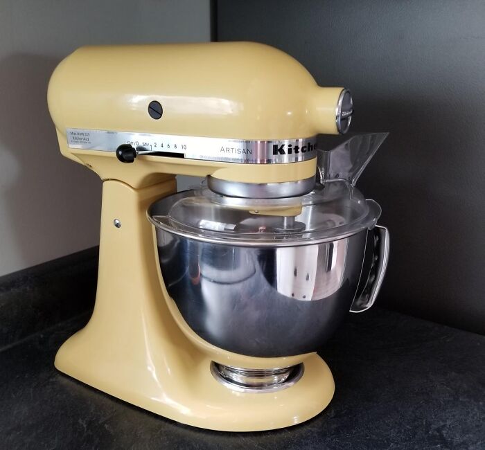 Yellow KitchenAid stand mixer on a countertop, a popular last minute Mother's Day gift for kitchen lovers.