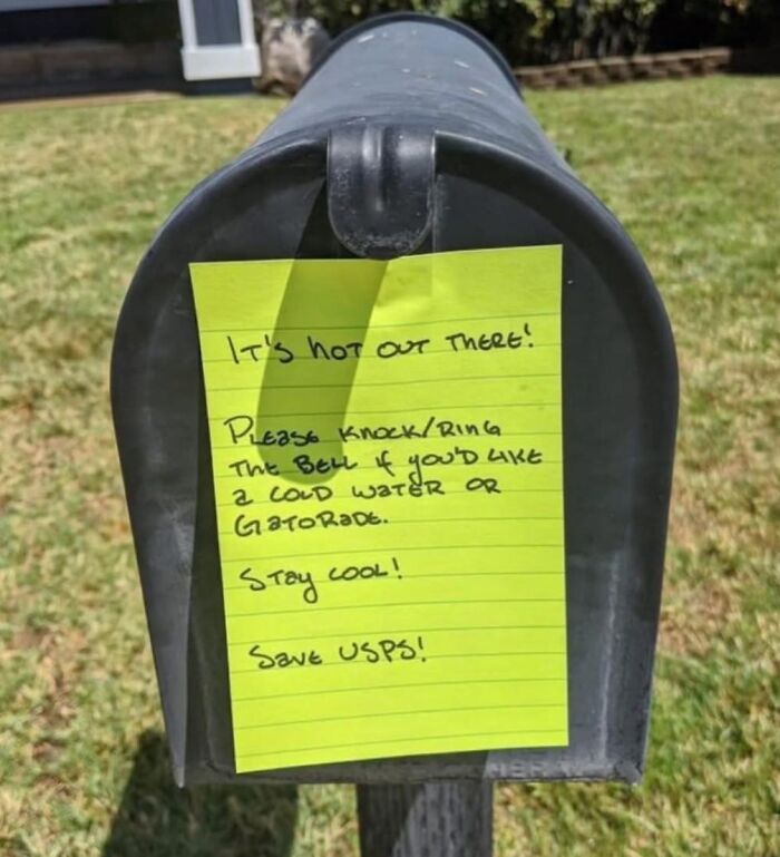 Mailbox with a handwritten wholesome meme note offering cold water or Gatorade to delivery people on a hot day.