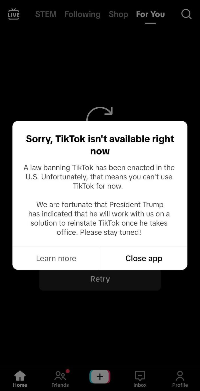 Notification on a smartphone screen about TikTok ban in the US, reflecting current life in the US through American views.