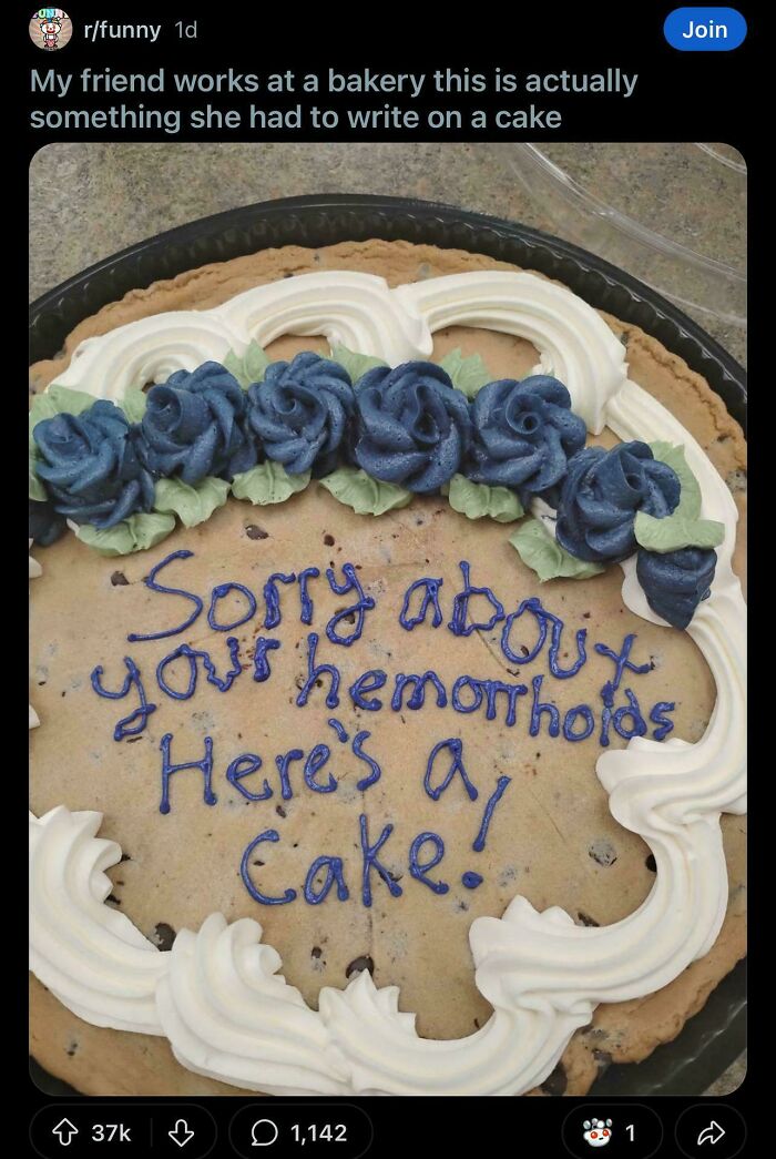 Cookie cake with blue frosting flowers and humorous message, an example of outrageous lies people tried to pass off as real.