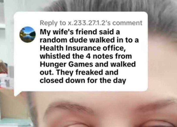 Screenshot of an outrageous lie comment about a random dude whistling Hunger Games notes causing a Health Insurance office to close.