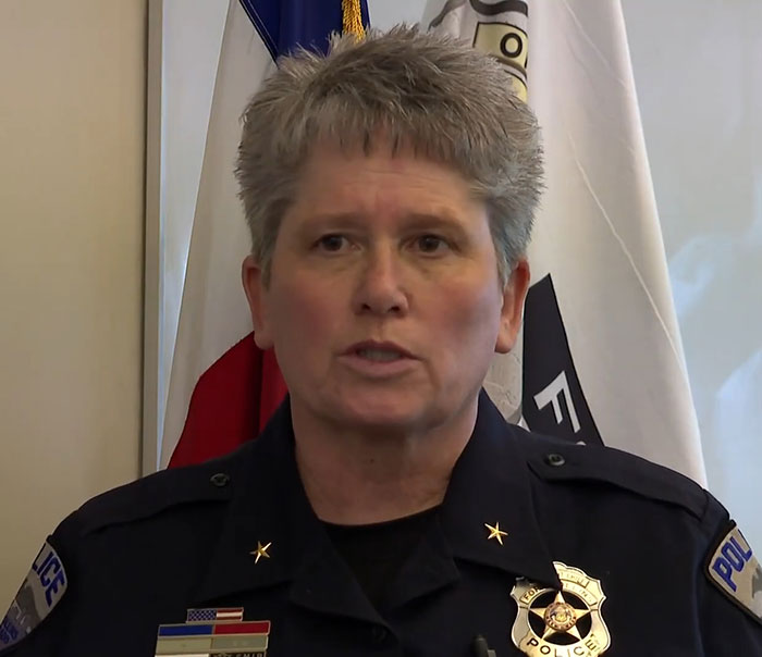 A police officer discusses a missing teen girl case at a press conference. A police officer discusses a missing teen girl case at a press conference.