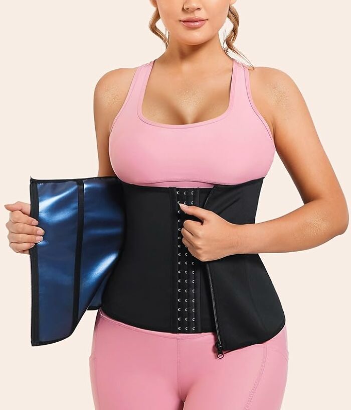 Woman wearing pink activewear demonstrating a black waist trainer from an Amazon haul finds collection.