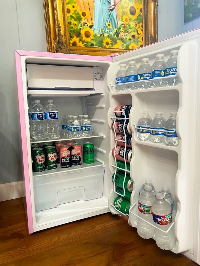 Mini fridge stocked with drinks, highlighting one of Amazon's most-wished-for items.
