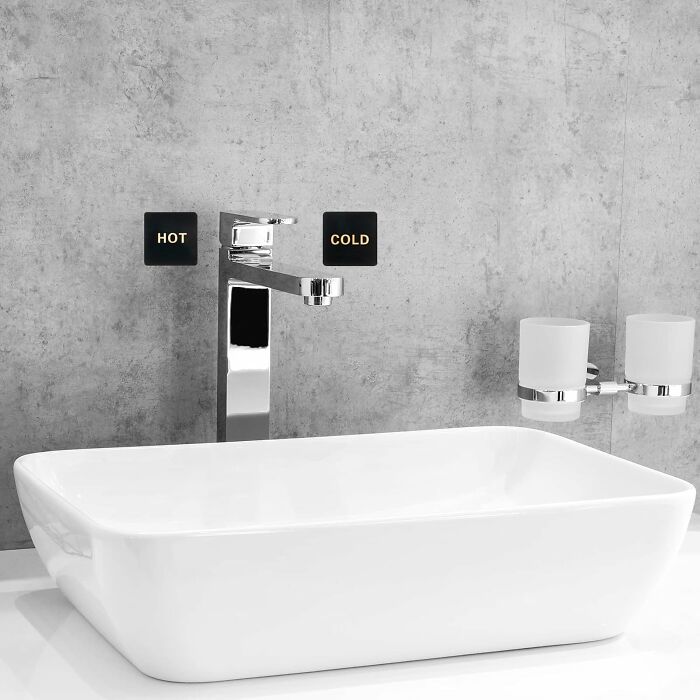 Modern bathroom faucet with hot and cold taps, showcasing stylish low-cost shopping options from Amazon Haul.