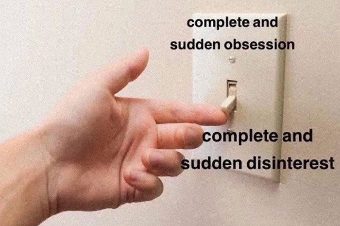 Hand flipping a light switch labeled "complete and sudden obsession" and "complete and sudden disinterest," depicting philosophy memes.