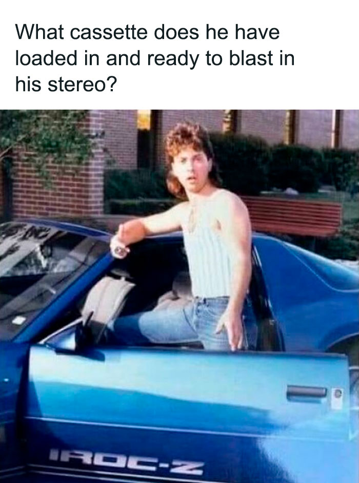 Young man in a tank top leaning on a blue IROC-Z car with the caption about cassette tapes, evoking nostalgia.