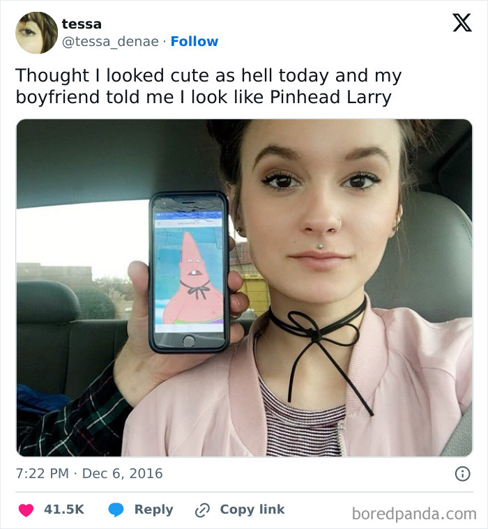 Woman humorously compared to Pinhead Larry by boyfriend, holding phone with cartoon image.