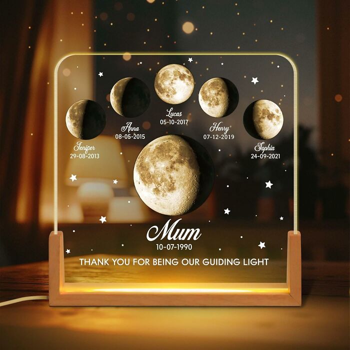 Personalized moon phase lamp gift for Mother's Day showing family dates and names with a warm glowing light display.