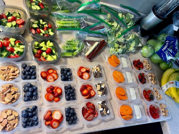Prepared healthy snacks and fruits, a genius kitchen find for sharing with the group chat.