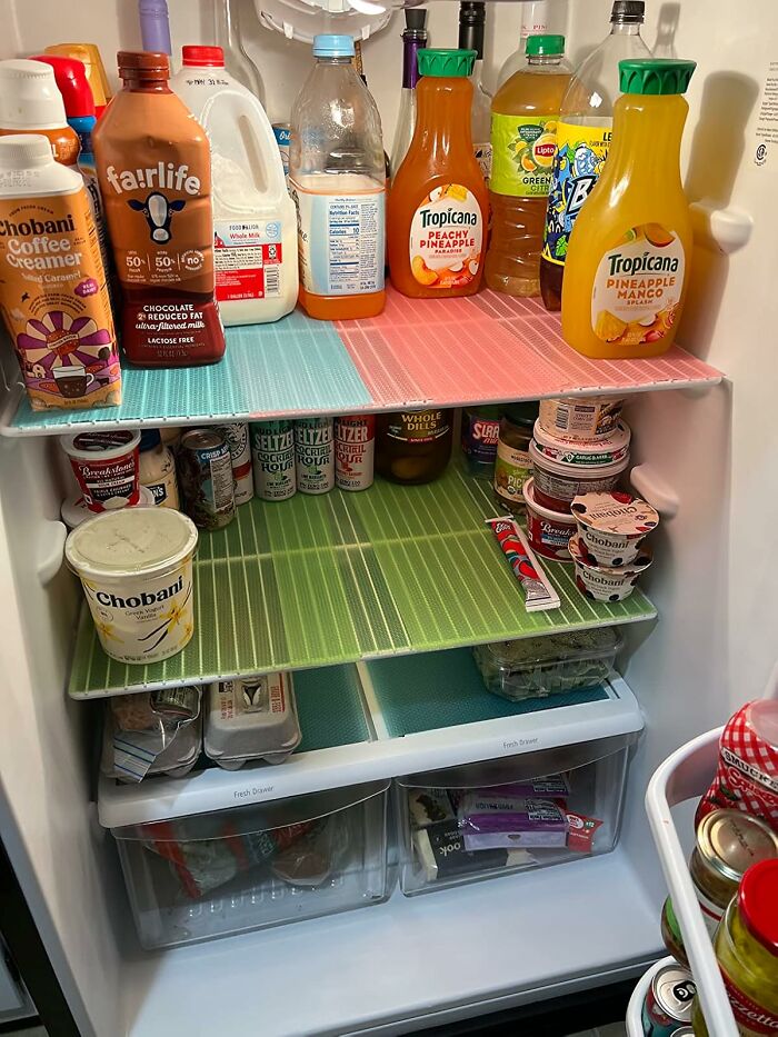 Organized fridge stocked with drinks, yogurt, and fresh produce offering 24 reasons Wednesday might not totally suck this week.