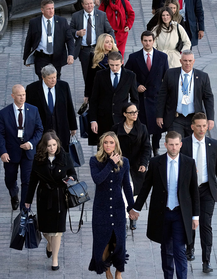 Group including Secret Service ensuring safety on campus.