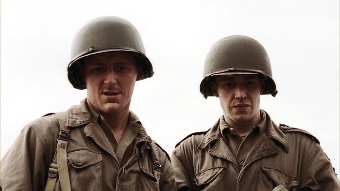 Two soldiers in military uniforms and helmets, representing a show rated 10/10 from start to finish.