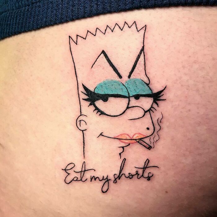 Simpsons tattoo of a character with blue eyeshadow, smoking, above the phrase "Eat my shorts."
