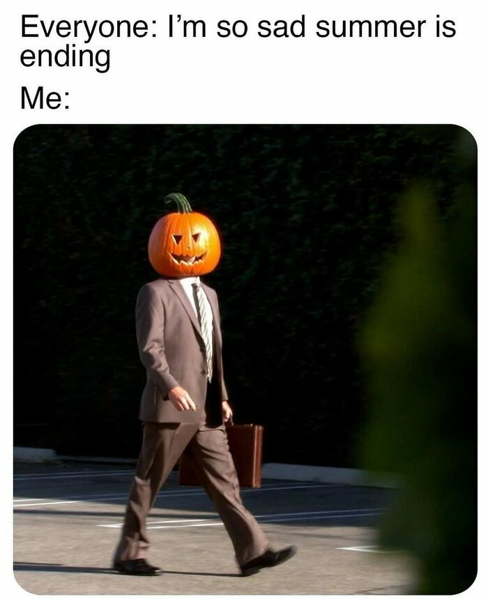 Person in suit with pumpkin head walking humorously, referencing "The Office" memes.