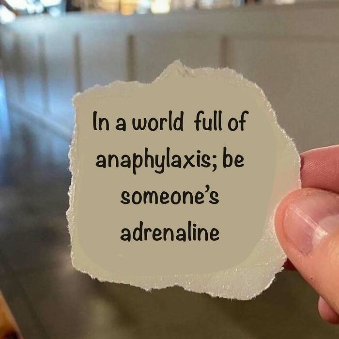 Hand holding a note that says "In a world full of anaphylaxis; be someone's adrenaline," humor in medical school.
