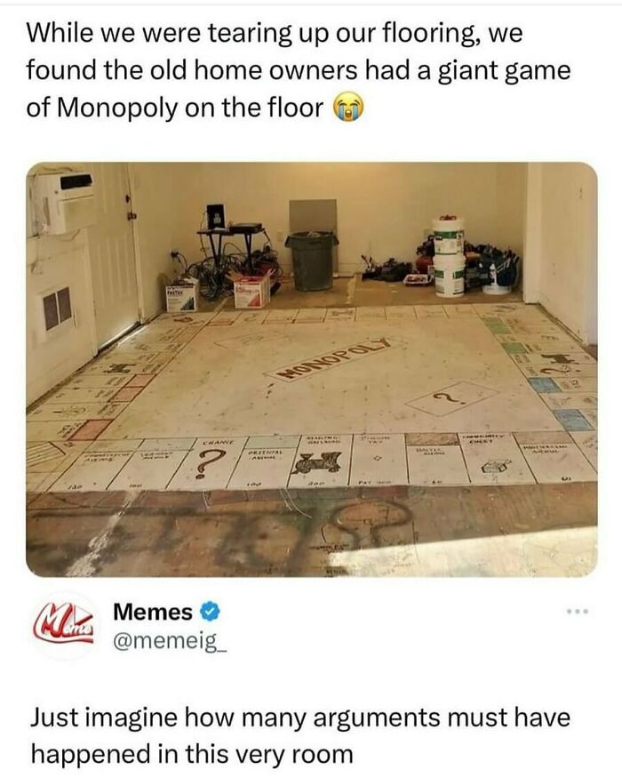 Giant Monopoly board painted on a garage floor, found during renovation; a humorous discovery to share with friends.